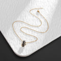 Collier main de squelette